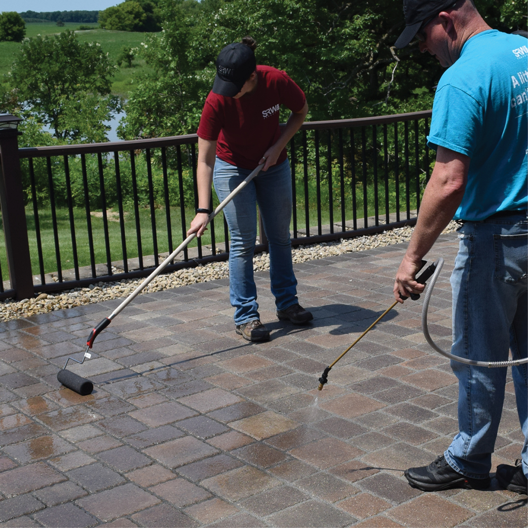 SRW Representatives demonstrating the efficacy of our hardscape sealers
